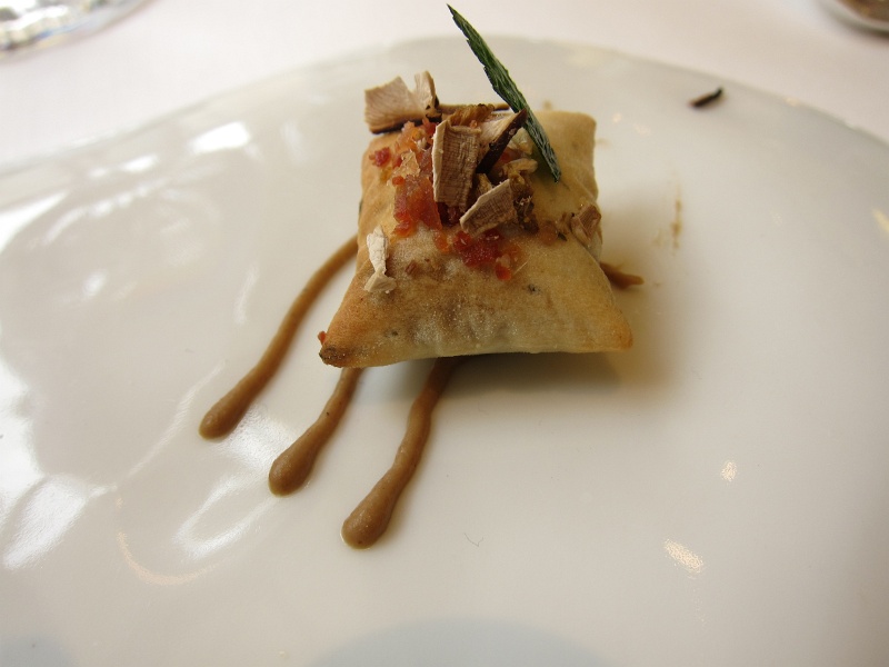 IMG_1411.JPG - Bread puff on porcini sauce and stuffed with truffle cream, topped with white truffle, ham, parsley crisp