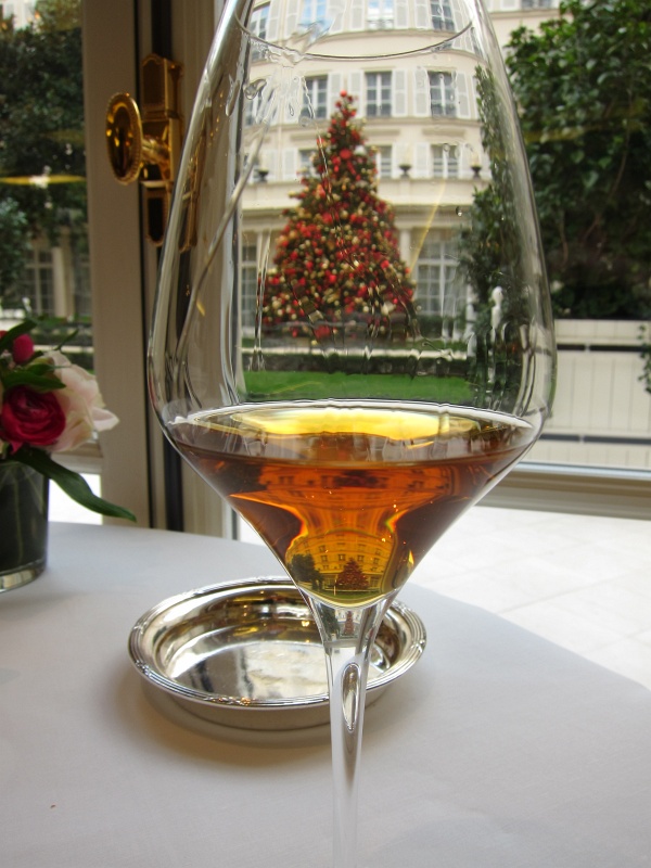 IMG_1436.JPG - Glass of Sauterne overlooking the Hotel Bristol courtyard with Christmas tree