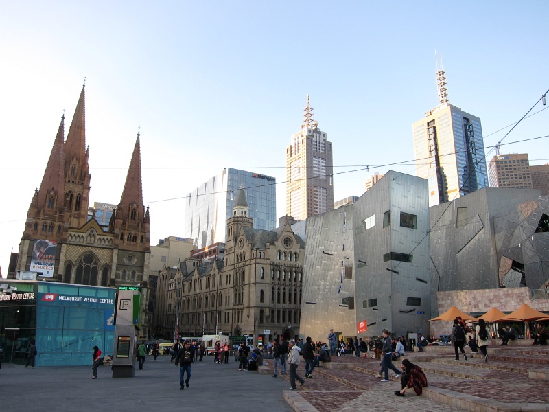 IMG_3282.JPG - Federation Square, the controversial (some would say ugly) central plaza that may be too modern for its own good.  St. Paul's Cathedral is on the left.