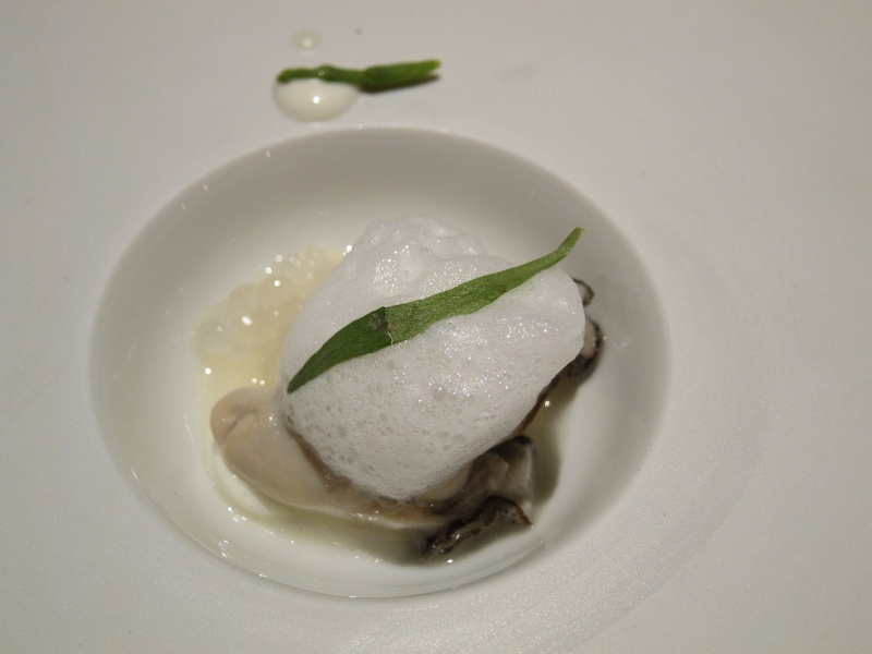 IMG_0047.JPG - Salty waters swirl: oyster japonais (lightly cooked), lemon foam with tarragon, crme frache, buerre blanc, tapioca, sake elderberry flower gele