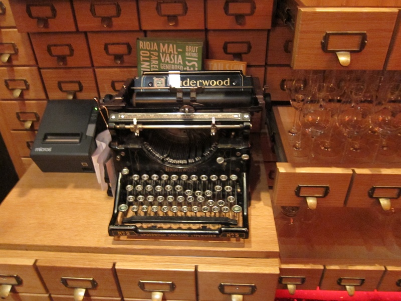 IMG_0685.JPG - An antique typewriter next to the actual, working receipt printer