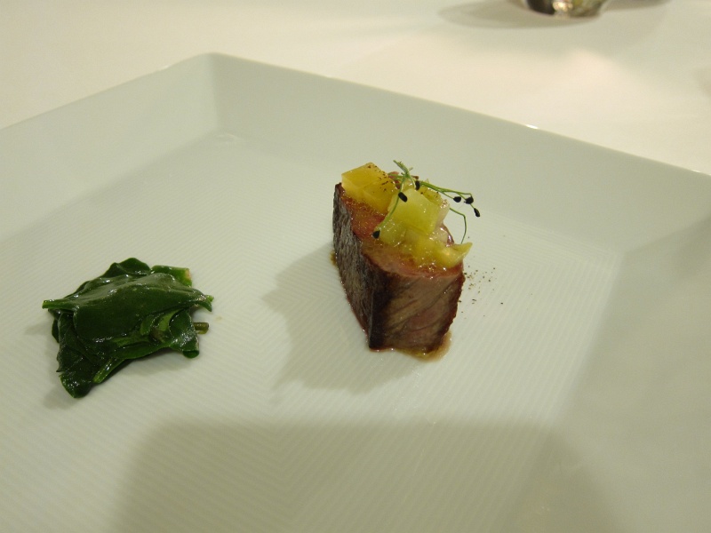 IMG_3416.JPG - Course #7 - 36 day aged beef sirloin, green tomatoes, wilted greens (sea spinach), cubeb
