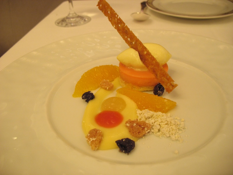 IMG_4981.JPG - Dessert: Citrus tasting, blood orange (red dot), Bergamot confit (above red dot), lemon curd (surrounding dots), navel oranges, olive oil-lemon sorbet, dried olives, tapioca crumble