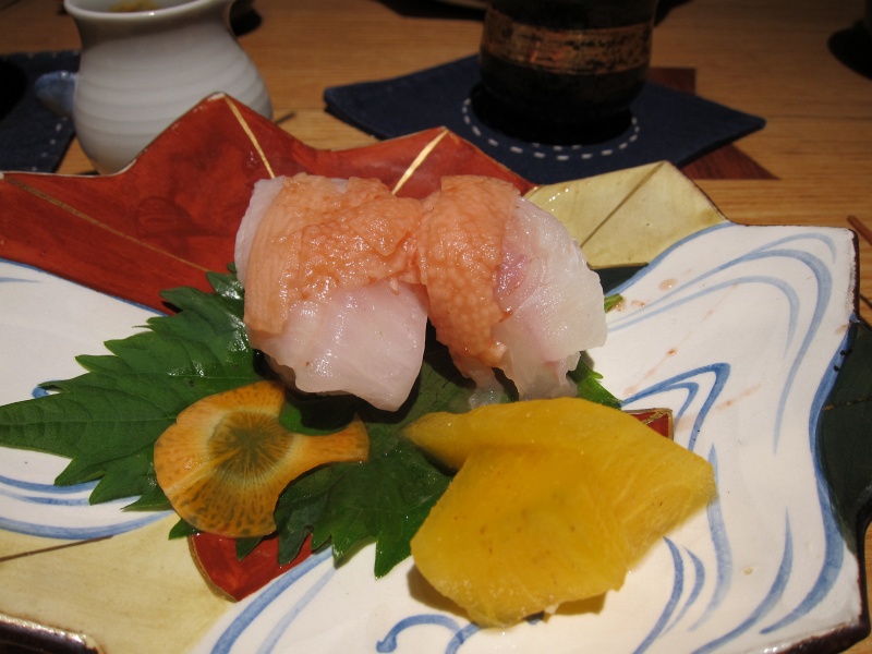 IMG_0200.JPG - The sushi course - hirame (flounder), with plum and soy-sauce flavored Japanese mountain yam (nagaimo), pickled persimmons, and a carrot slice that resembles a leaf (autumn theme)