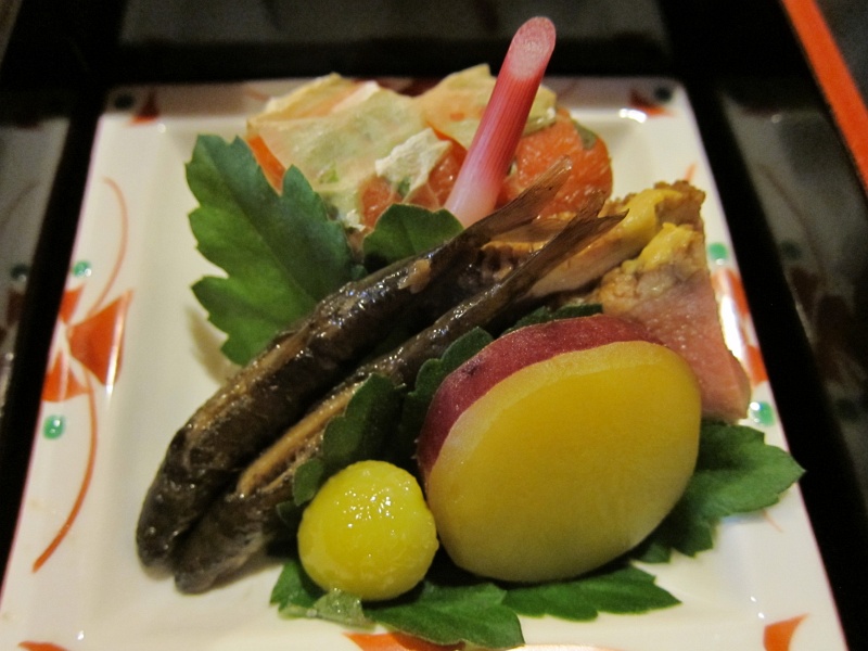 IMG_0227.JPG - In the front, two small cooked fish, a gingko nut, and potato