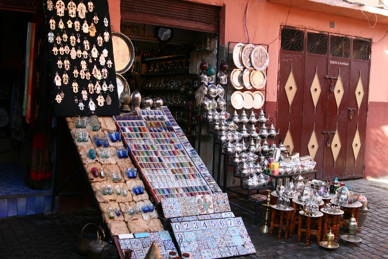 IMG_8391.JPG - Shop selling assorted metal trinkets, tea pots, and decorative tiles