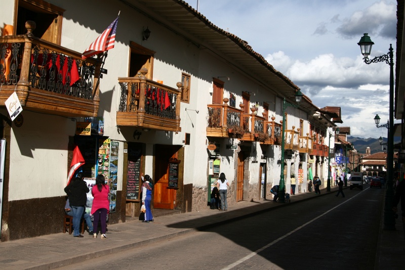 IMG_8917.JPG - One of the side streets leading to Plaza de Armas - Cusco architecture is heavily influenced by the Spanish, as witnessed by the wrought-iron balconies