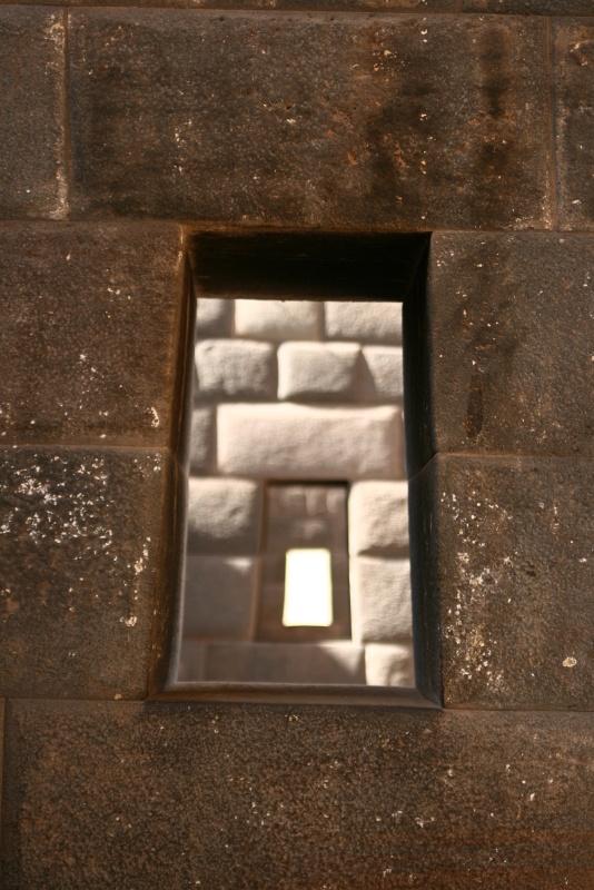 IMG_8991.JPG - Perfectly aligned trapezoid windows.  During summer solstice, the sun shines directly into a niche inside the complex where only the Inca emperor was permitted to sit.
