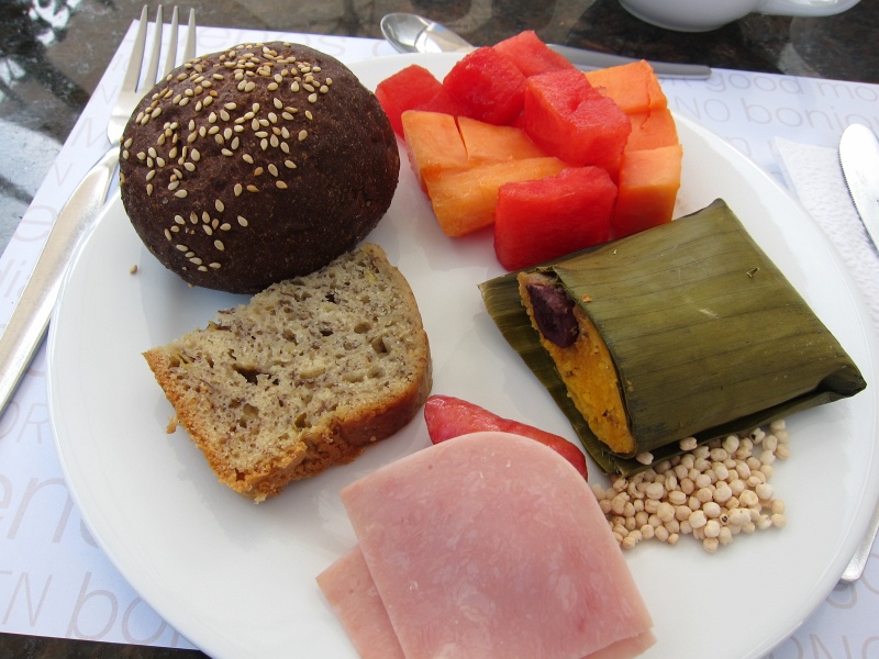 IMG_1639.JPG - Breakfast at our hotel (Tierra Viva) - various breads, ham, watermelon and papaya, tamale, and quinoa puff