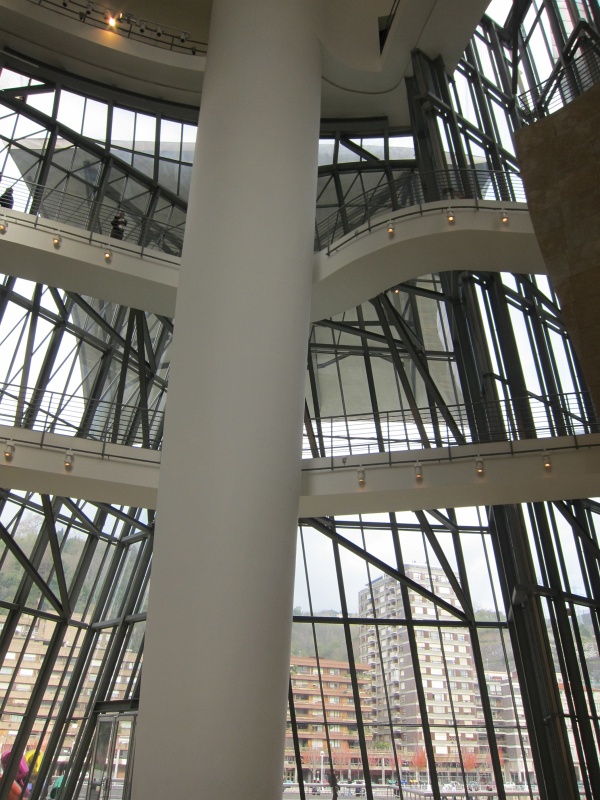 IMG_0356.JPG - Inside the atrium of the Guggenheim Museum.  Gehry designed the atrium to resemble the atrium of a heart, with all the galleries of the different levels leading away and flowing back into the atrium.