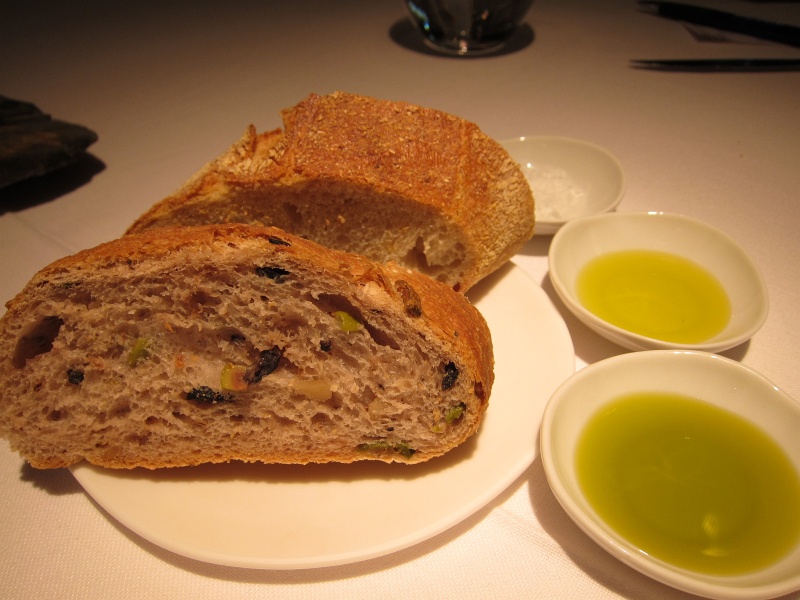 IMG_0151.JPG - Olive walnut and plain bread.  The Clos de la Torre produced the green grassy olive oil in the foreground.