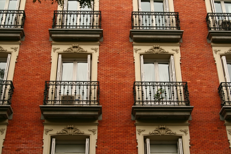 IMG_5931.JPG - Wrought iron balconies, red brick